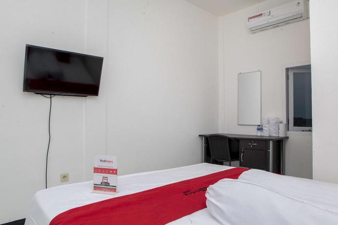 Imagen de la habitación del Hotel Reddoorz Near Telkom Corporate University. Foto 13