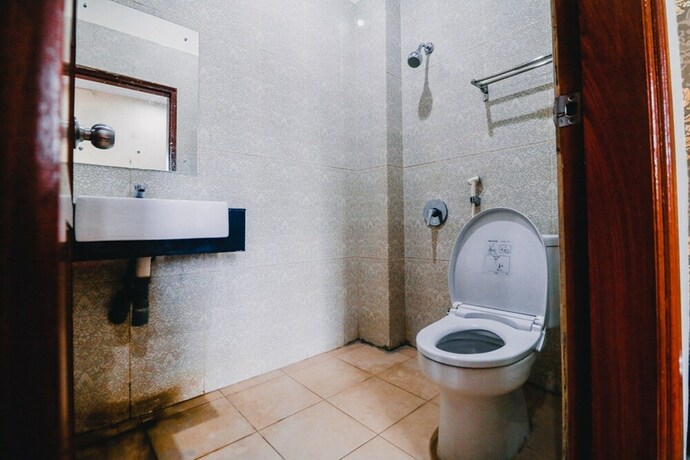 Imagen de la habitación del Hotel Reddoorz Plus @ Ap Pettarani. Foto 7