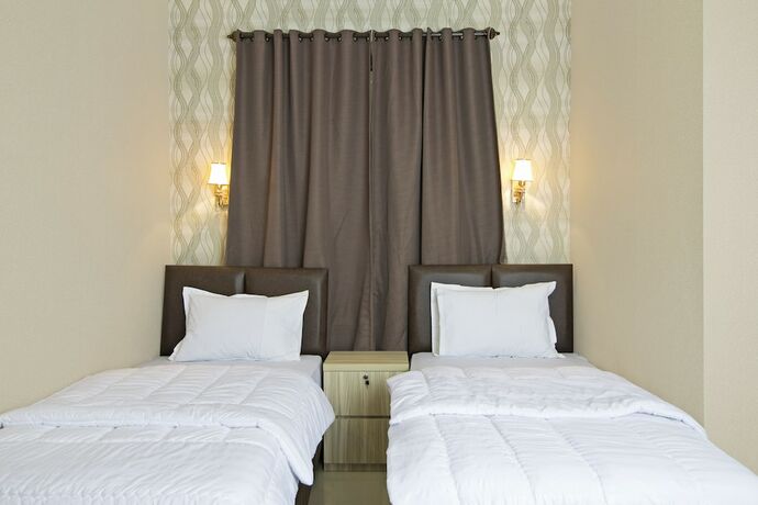 Imagen general del Hotel Reddoorz Plus @ Cideng Barat. Foto 18