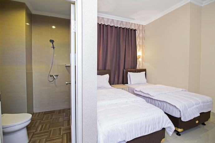 Imagen de la habitación del Hotel Reddoorz Plus @ Cideng Barat. Foto 20