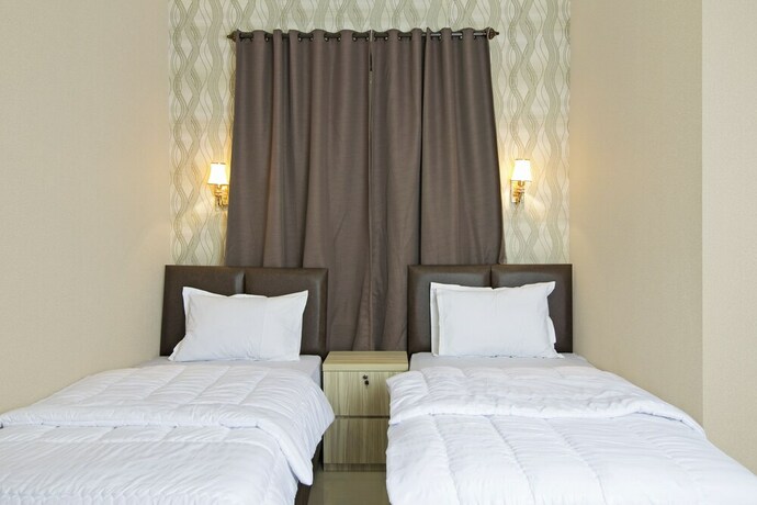 Imagen de la habitación del Hotel Reddoorz Plus @ Cideng Barat. Foto 28
