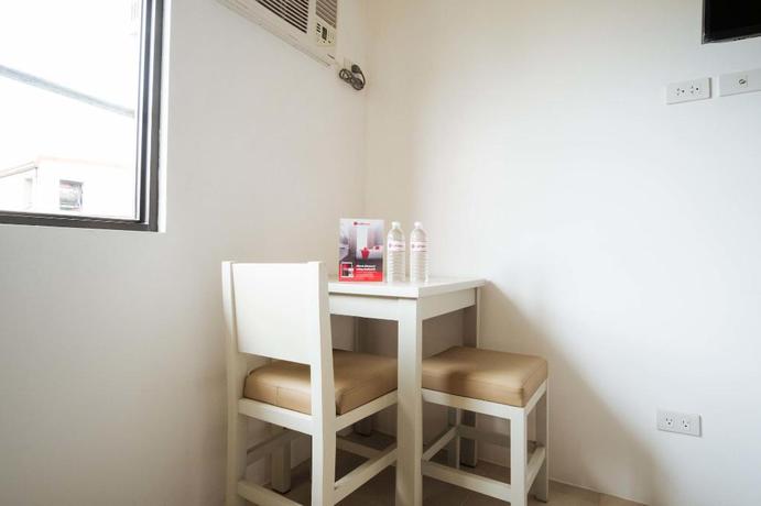 Imagen de la habitación del Hotel Reddoorz Plus @ Evangelista Street Makati. Foto 16