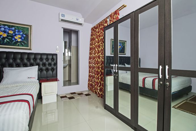 Imagen de la habitación del Hotel Reddoorz Plus @ Guntur Raya Setiabudi. Foto 14