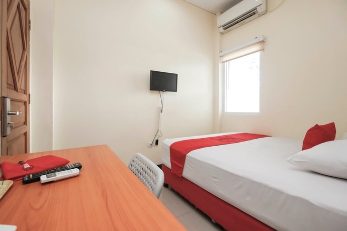 Imagen de la habitación del Hotel Reddoorz Plus @ Jalan Pemuda Jakarta. Foto 15