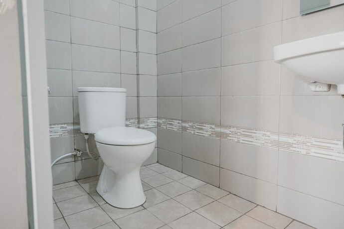 Imagen de la habitación del Hotel Reddoorz Plus @ Karet Pedurenan 3. Foto 18