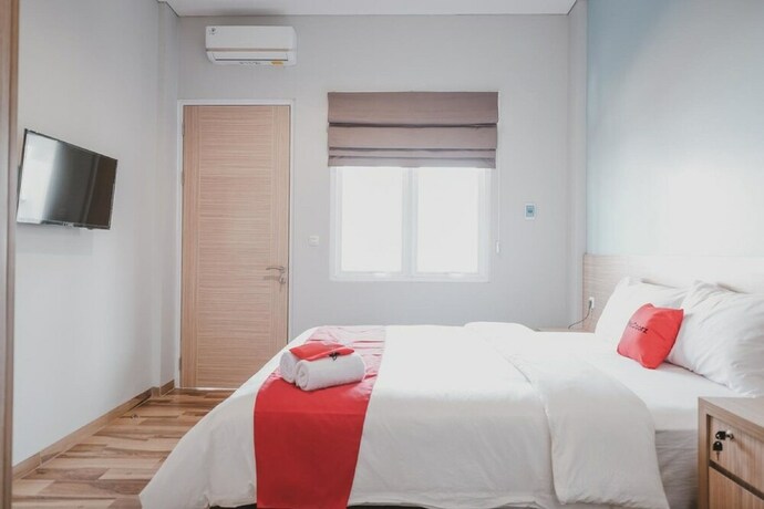 Imagen de la habitación del Hotel Reddoorz Plus @ Karet Pedurenan 3. Foto 22