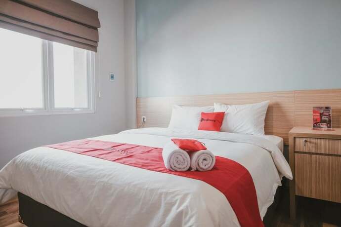 Imagen de la habitación del Hotel Reddoorz Plus @ Karet Pedurenan 3. Foto 27