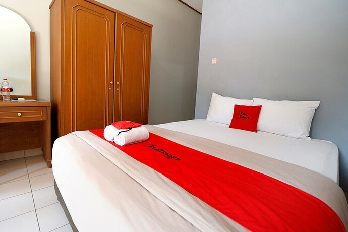 Imagen de la habitación del Hotel Reddoorz Plus @ Karet Pedurenan 3. Foto 30