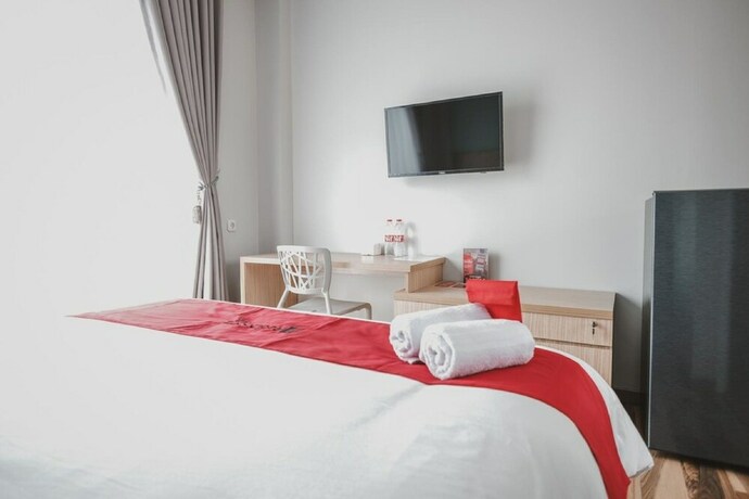 Imagen de la habitación del Hotel Reddoorz Plus @ Karet Pedurenan 3. Foto 31