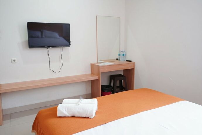 Imagen general del Hotel Reddoorz Plus @ Mas Mansyur. Foto 11