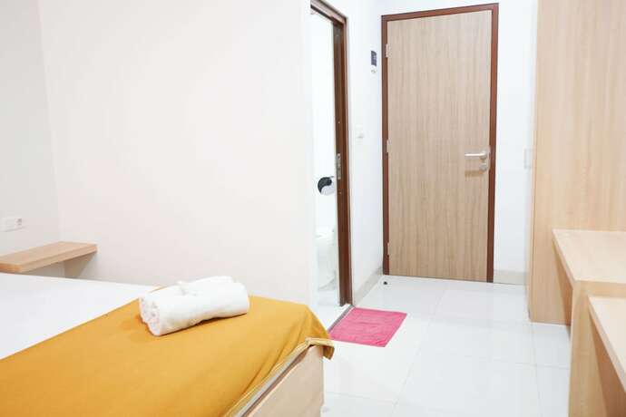Imagen de la habitación del Hotel Reddoorz Plus @ Mas Mansyur. Foto 23