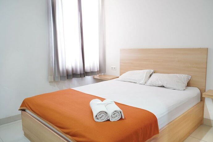 Imagen de la habitación del Hotel Reddoorz Plus @ Mas Mansyur. Foto 24