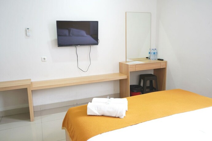 Imagen de la habitación del Hotel Reddoorz Plus @ Mas Mansyur. Foto 28