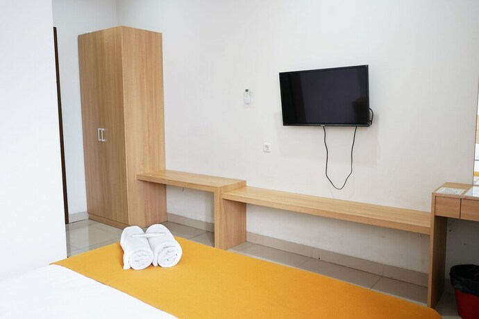 Imagen de la habitación del Hotel Reddoorz Plus @ Mas Mansyur. Foto 29