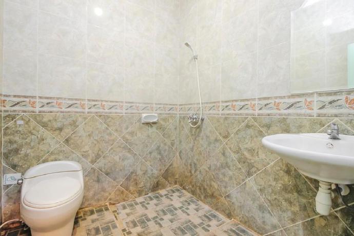 Imagen de la habitación del Hotel Reddoorz Plus Near Alun Alun Kejaksan Cirebon. Foto 11
