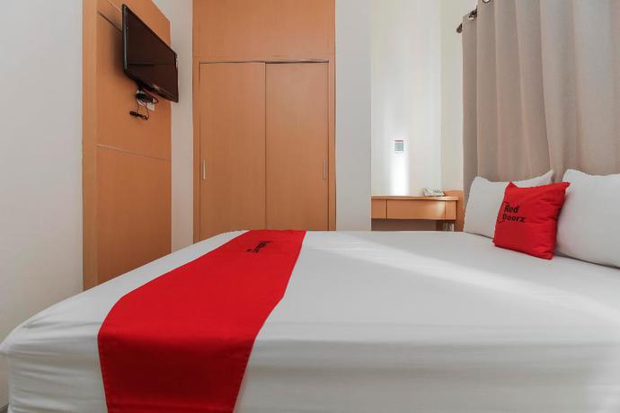 Imagen de la habitación del Hotel Reddoorz Plus Near Galaxy Bekasi. Foto 7