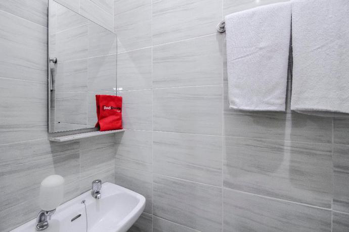 Imagen de la habitación del Hotel Reddoorz Plus Near Galaxy Bekasi. Foto 15