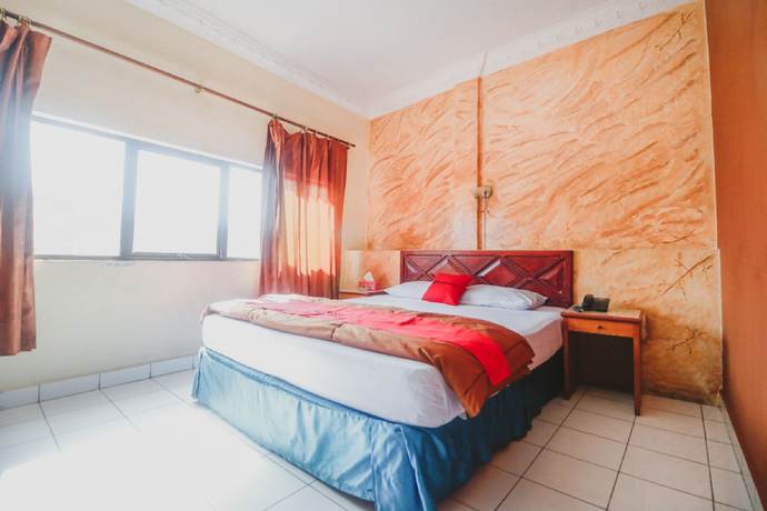 Imagen de la habitación del Hotel Reddoorz Plus Near Jambi Prima Mall. Foto 13