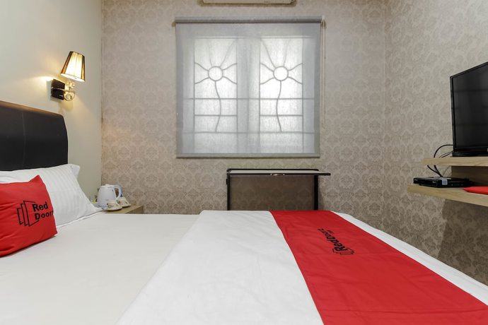 Imagen de la habitación del Hotel Reddoorz Plus Near Lippo Cikarang Mall. Foto 6