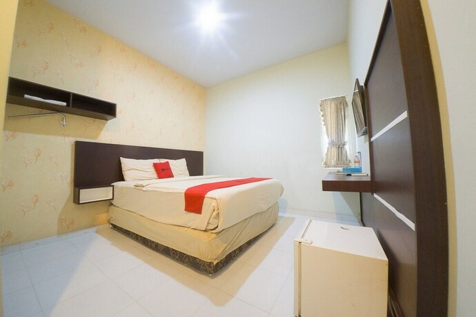 Imagen de la habitación del Hotel Reddoorz Plus Near Mall Panakukang 2. Foto 12