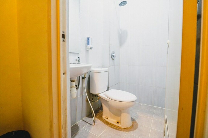 Imagen de la habitación del Hotel Reddoorz Plus Near Mall Panakukang 2. Foto 13