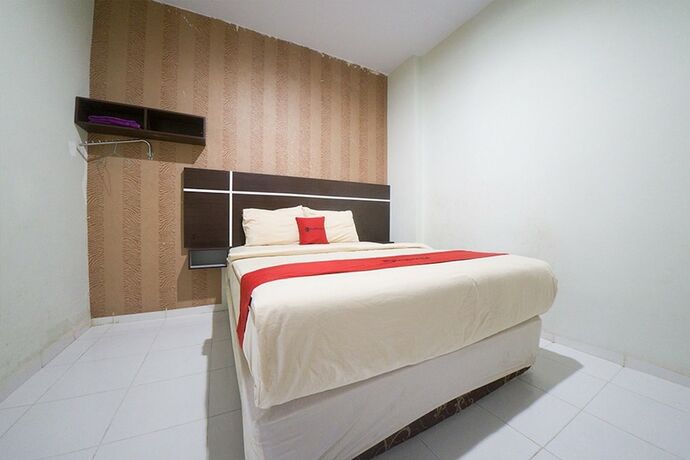 Imagen de la habitación del Hotel Reddoorz Plus Near Mall Panakukang 2. Foto 14