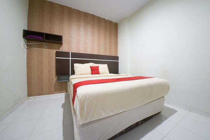 Imagen de la habitación del Hotel Reddoorz Plus Near Mall Panakukang 2. Foto 17