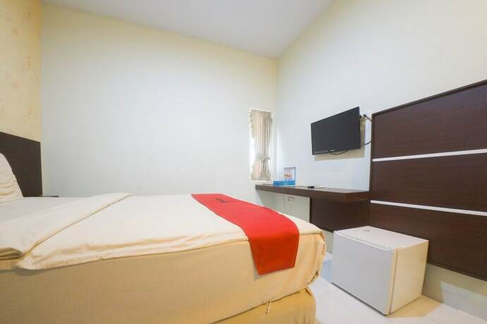Imagen de la habitación del Hotel Reddoorz Plus Near Mall Panakukang 2. Foto 18