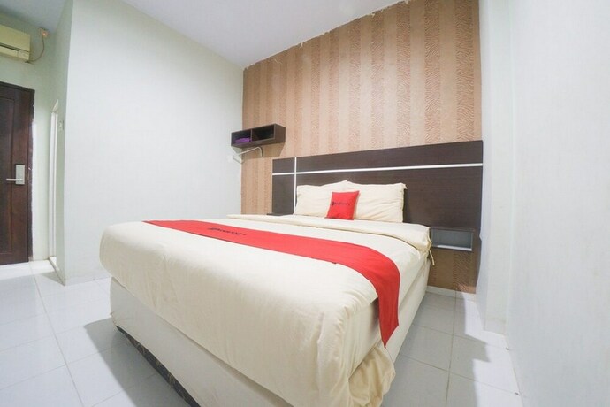 Imagen de la habitación del Hotel Reddoorz Plus Near Mall Panakukang 2. Foto 22