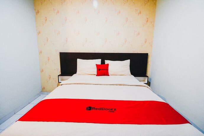 Imagen de la habitación del Hotel Reddoorz Plus Near Mall Panakukang 2. Foto 23