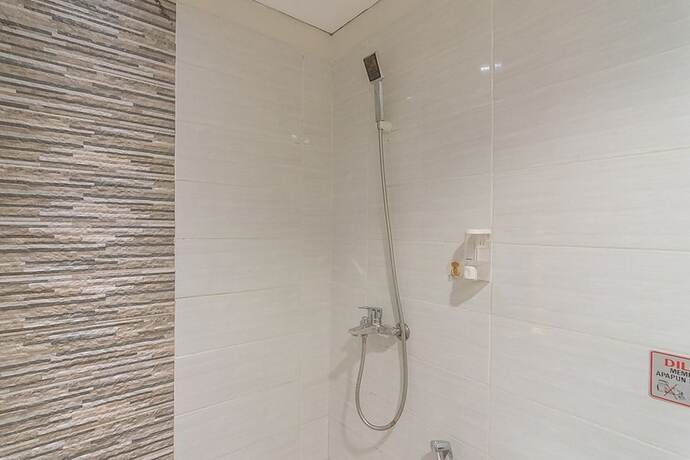 Imagen de la habitación del Hotel Reddoorz Plus Near Sepinggan Airport 3. Foto 15