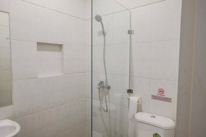 Imagen de la habitación del Hotel Reddoorz Plus Near Soekarno Hatta Airport Taman Mahkota. Foto 19