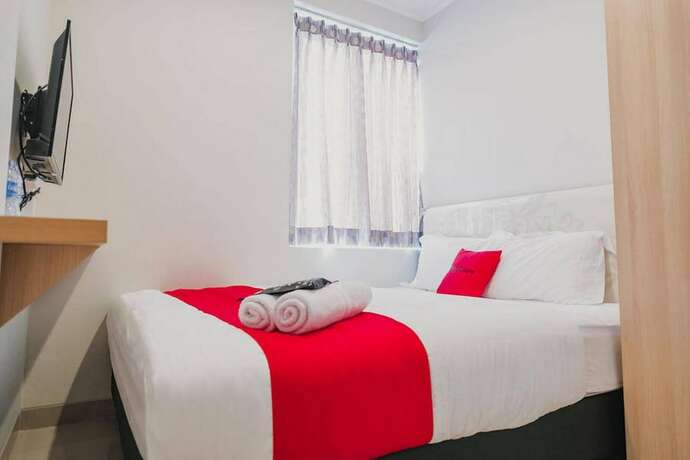 Imagen de la habitación del Hotel Reddoorz Plus Near Soekarno Hatta Airport Taman Mahkota. Foto 20