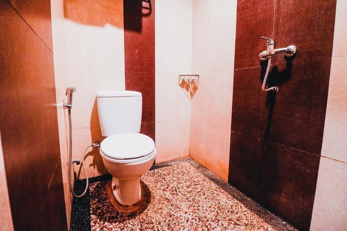Imagen de la habitación del Hotel Reddoorz Plus Near Sultan Hasanuddin Airport. Foto 8