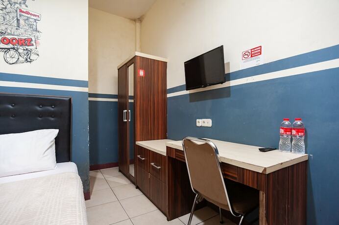 Imagen de la habitación del Hotel Reddoorz Plus Near Universitas Indonesia. Foto 23
