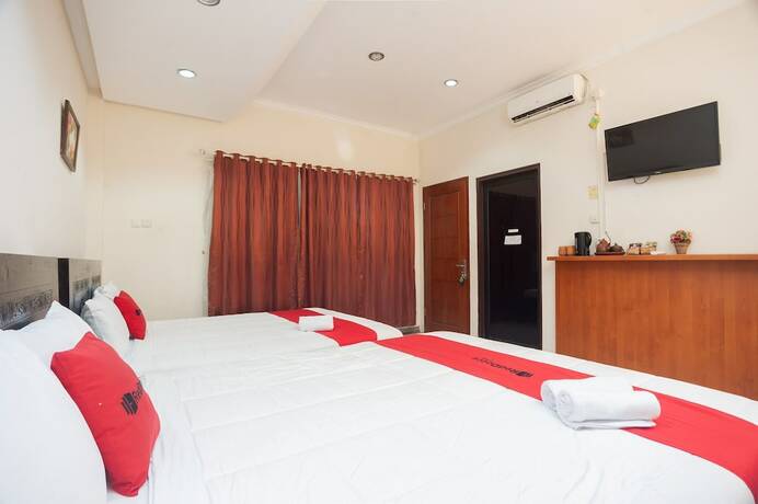 Imagen de la habitación del Hotel Reddoorz Plus Near Universitas Indonesia. Foto 25