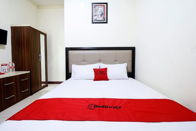 Imagen de la habitación del Hotel Reddoorz Plus Near Universitas Indonesia. Foto 28