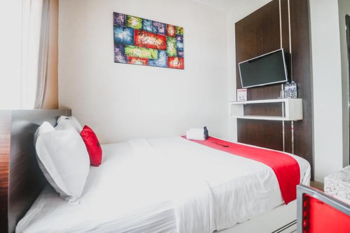 Imagen de la habitación del Hotel Reddoorz Plus Near Universitas Negeri Makassar. Foto 7