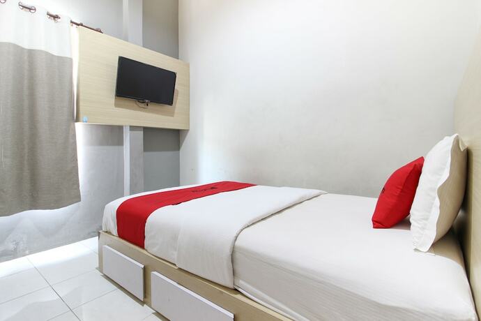 Imagen de la habitación del Hotel Reddoorz Plus Near Upn Jogjakarta 2. Foto 24