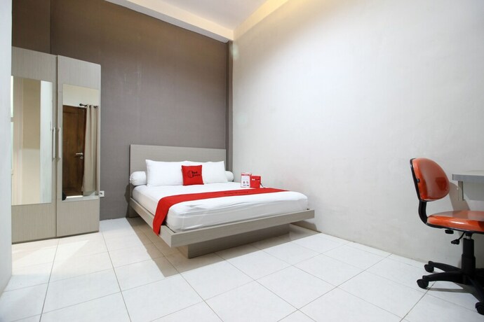 Imagen de la habitación del Hotel Reddoorz Plus Near Upn Jogjakarta 2. Foto 26