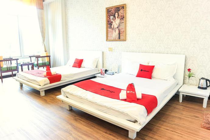 Imagen de la habitación del Hotel Reddoorz Plus @ Nguyen Thi Thap Street. Foto 2