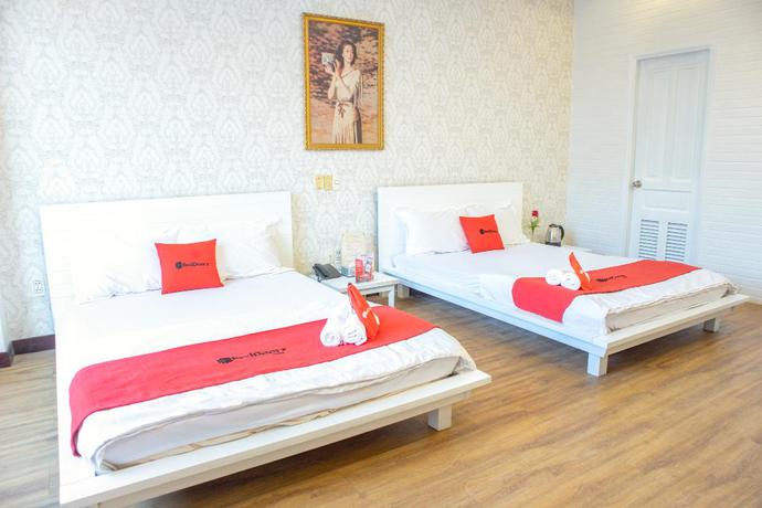 Imagen de la habitación del Hotel Reddoorz Plus @ Nguyen Thi Thap Street. Foto 3
