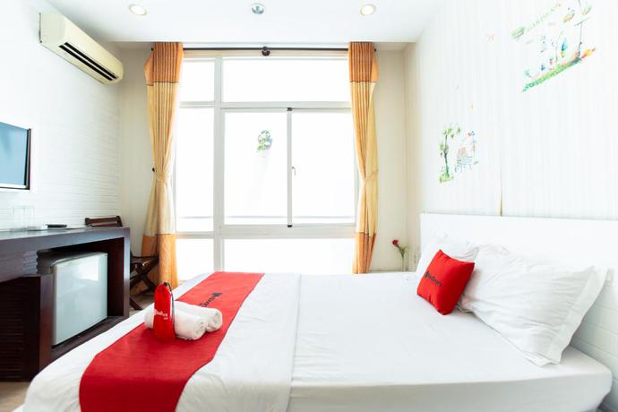 Imagen de la habitación del Hotel Reddoorz Plus @ Nguyen Thi Thap Street. Foto 4