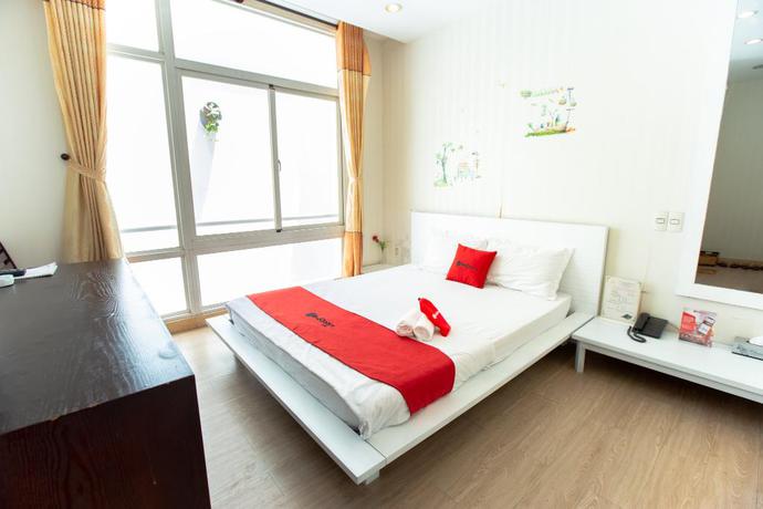Imagen de la habitación del Hotel Reddoorz Plus @ Nguyen Thi Thap Street. Foto 5