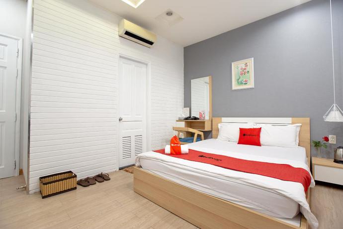 Imagen de la habitación del Hotel Reddoorz Plus @ Nguyen Thi Thap Street. Foto 7
