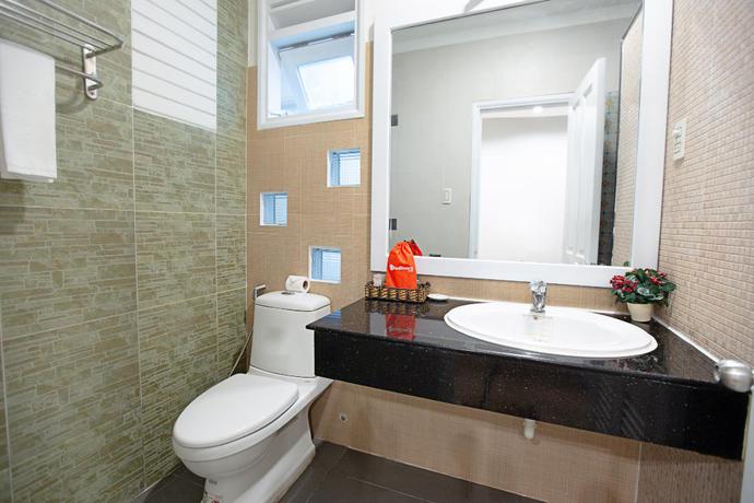 Imagen de la habitación del Hotel Reddoorz Plus @ Nguyen Thi Thap Street. Foto 9