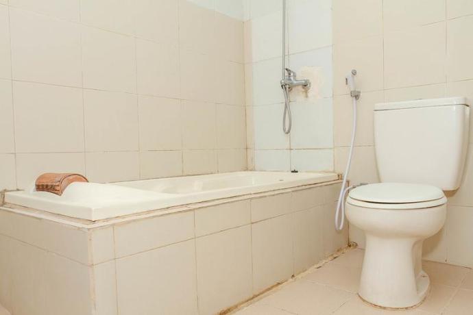 Imagen de la habitación del Hotel Reddoorz Plus @ Otista Garut. Foto 11