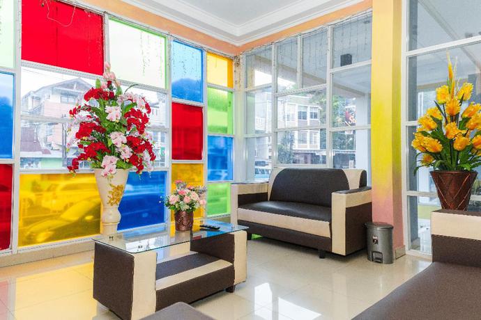 Imagen de los interiores del Hotel Reddoorz Plus @ Paal 2 Manado. Foto 19