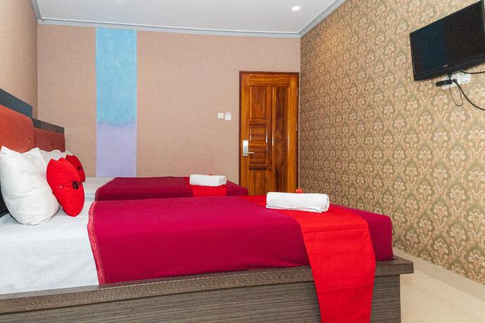 Imagen de la habitación del Hotel Reddoorz Plus @ Paal 2 Manado. Foto 12