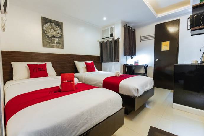 Imagen de la habitación del Hotel Reddoorz Plus @ Poblacion Makati. Foto 10